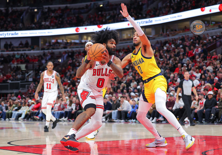 CHICAGO, IL - DECEMBER 28: Tyrese Haliburton #0 of the Indiana Pacers guards Coby White #0 of the Chicago Bulls during the second half at the at United Center on December 28, 2023 in Chicago, Illinois. (Photo by Melissa Tamez/Icon Sportswire)