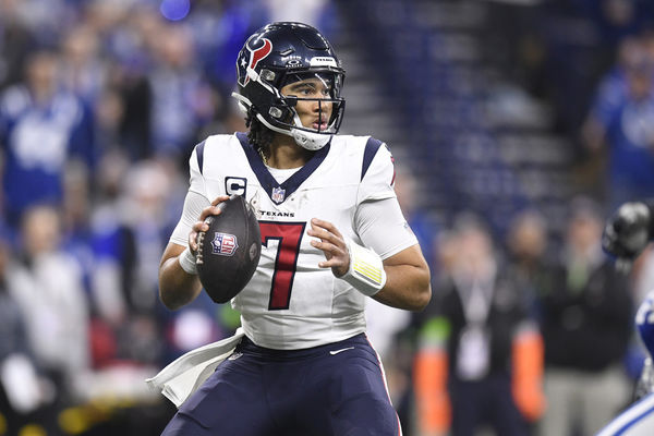 INDIANAPOLIS, IN - JANUARY 06: Houston Texans Quarterback C.J. Stroud (7) looks to pass during the NFL game between the Houston Texans and the Indianapolis Colts on January 6, 2024, at Lucas Oil Stadium in Indianapolis, Indiana. (Photo by Michael Allio/Icon Sportswire)