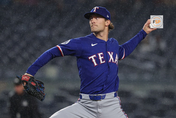 May 6, 2026; Bronx, New York, USA; Texas Rangers pitcher Jacob Latz (67) delivers a pitch during the ninth inning against the New York Yankees at Yankee Stadium. Credit: Vincent Carchietta-Imagn Images