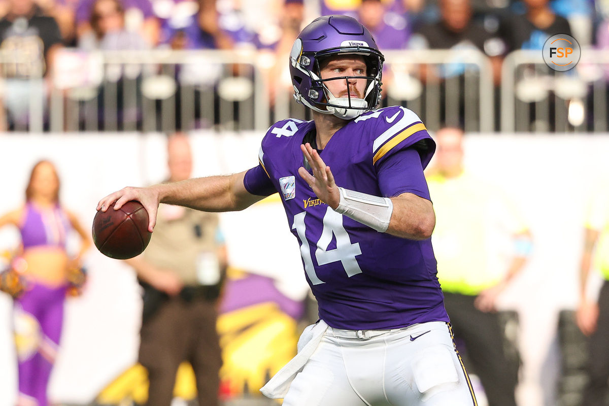 Oct 20, 2024; Minneapolis, Minnesota, USA; Minnesota Vikings quarterback Sam Darnold (14) throws the ball against the Detroit Lions during the third quarter at U.S. Bank Stadium. Credit: Matt Krohn-Imagn Images