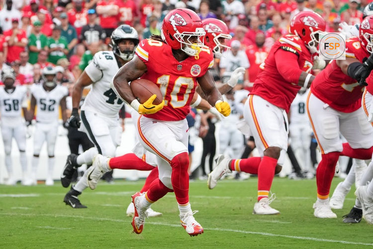 Sep 14, 2025; Kansas City, Missouri, USA; Kansas City Chiefs running back Isiah Pacheco (10) carries the ball against the Philadelphia Eagles during the third quarter of the game at GEHA Field at Arrowhead Stadium. Credit: Denny Medley-Imagn Images