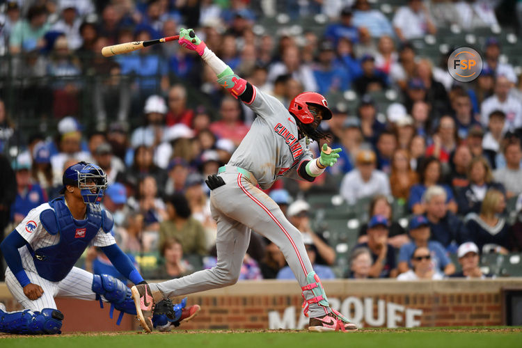 Sep 29, 2024; Chicago, Illinois, USA; Cincinnati Reds shortstop Elly De La Cruz (44) hits a two-run triple during the tenth inning against the Chicago Cubs at Wrigley Field. Credit: Patrick Gorski-Imagn Images