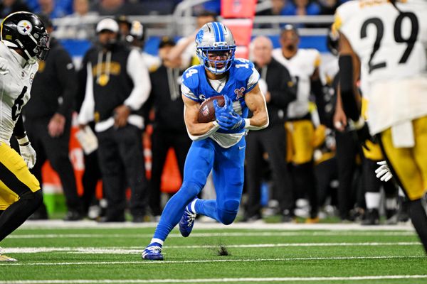 Dec 21, 2025; Detroit, Michigan, USA; Detroit Lions wide receiver Amon-Ra St. Brown (14) runs the ball during the second quarter against the Pittsburgh Steelers at Ford Field. Mandatory Credit: Lon Horwedel-Imagn Images