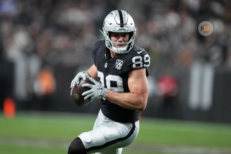 Dec 22, 2024; Paradise, Nevada, USA; Las Vegas Raiders tight end Brock Bowers (89) carries the ball against the Jacksonville Jaguars in the second half at Allegiant Stadium. Credit: Kirby Lee-Imagn Images