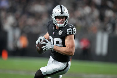 Dec 22, 2024; Paradise, Nevada, USA; Las Vegas Raiders tight end Brock Bowers (89) carries the ball against the Jacksonville Jaguars in the second half at Allegiant Stadium. Mandatory Credit: Kirby Lee-Imagn Images