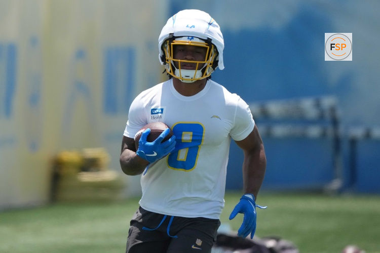 May 27, 2025; El Segundo, CA, USA; Los Angeles Chargers running back Omarion Hampton (8) carries the ball during organized team activities at The Bolt. Credit: Kirby Lee-Imagn Images