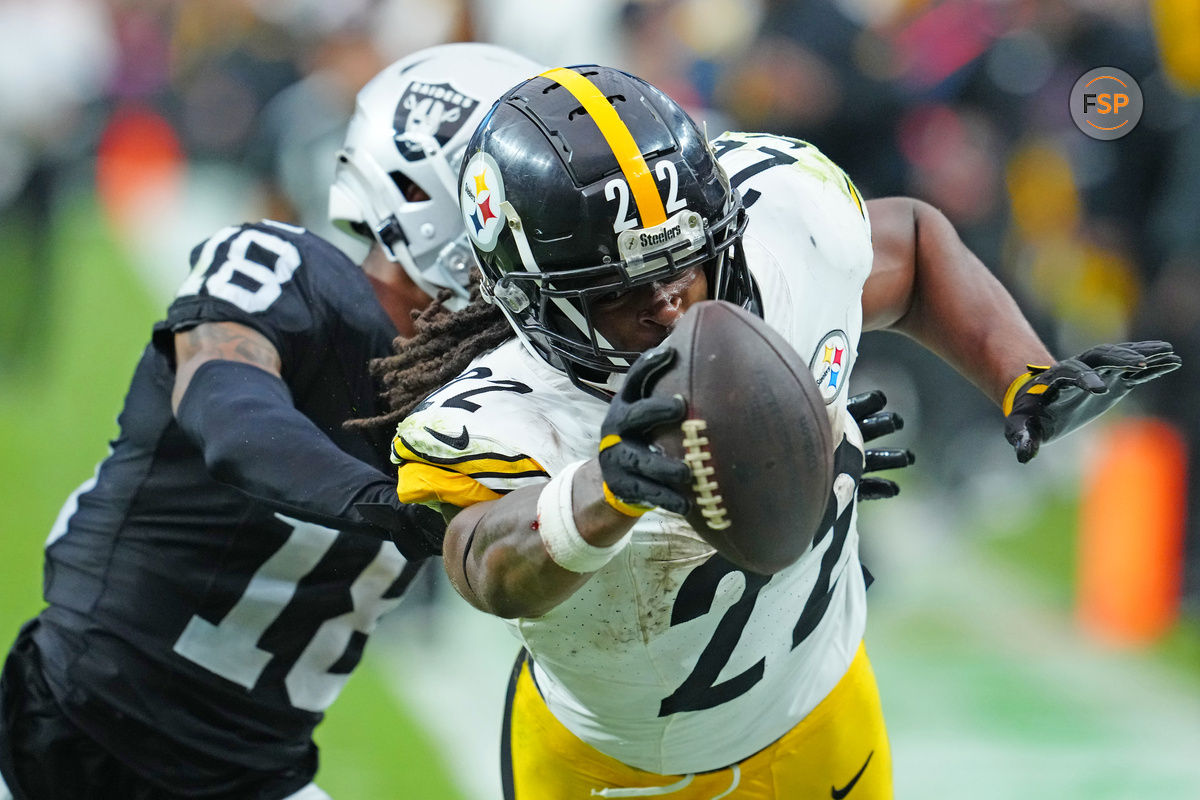 Oct 13, 2024; Paradise, Nevada, USA; Pittsburgh Steelers running back Najee Harris (22) is pushed out of bounds by Las Vegas Raiders cornerback Jack Jones (18) during the third quarter at Allegiant Stadium. Credit: Stephen R. Sylvanie-Imagn Images