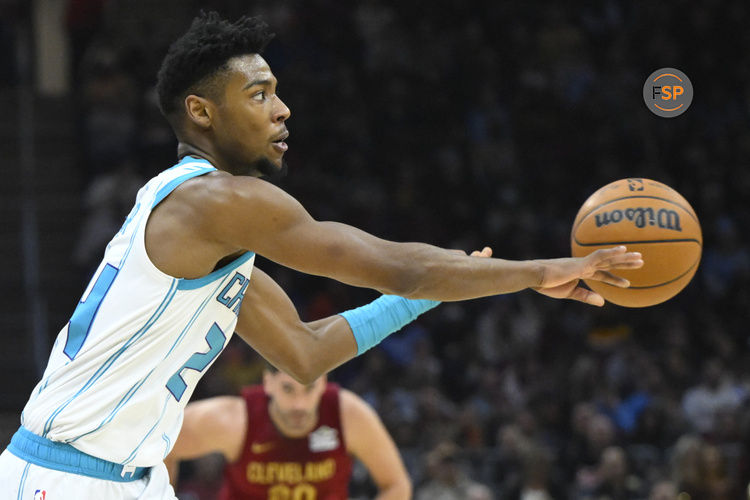 Jan 5, 2025; Cleveland, Ohio, USA; Charlotte Hornets forward Brandon Miller (24) throws a pass in the second quarter against the Cleveland Cavaliers at Rocket Mortgage FieldHouse. Credit: David Richard-Imagn Images