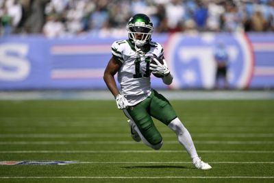 Sep 13, 2026; Nashville, Tennessee, USA;  New York Jets wide receiver Omar Cooper J.r (11) runs with the ball against the Tennessee Titans during the first quarter at Nissan Stadium.  Mandatory Credit: Steve Roberts-Imagn Images