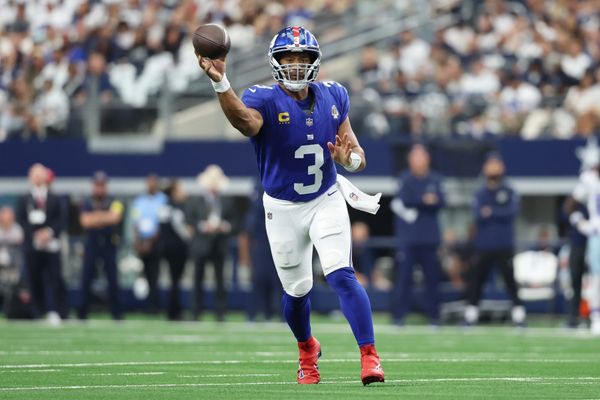 Sep 14, 2025; Arlington, Texas, USA; New York Giants quarterback Russell Wilson (3) passes the ball against the Dallas Cowboys during the first quarter at AT&T Stadium. Mandatory Credit: Kevin Jairaj-Imagn Images