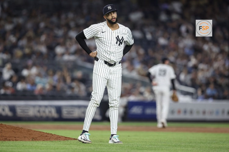 Jul 30, 2025; Bronx, New York, USA;  New York Yankees relief pitcher Devin Williams (38) reacts after giving up a two run home run in the ninth inning against the Tampa Bay Rays at Yankee Stadium. Credit: Wendell Cruz-Imagn Images