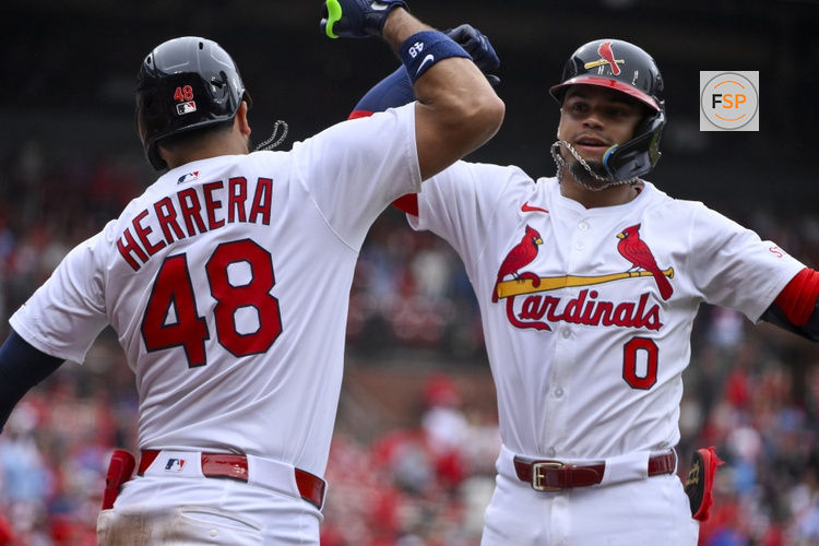 May 25, 2025; St. Louis, Missouri, USA;  St. Louis Cardinals shortstop Masyn Winn (0) is congratulated by designated hitter Ivan Herrera (48) after hitting a solo home run against the Arizona Diamondbacks during the third inning at Busch Stadium. Credit: Jeff Curry-Imagn Images