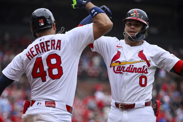 May 25, 2025; St. Louis, Missouri, USA;  St. Louis Cardinals shortstop Masyn Winn (0) is congratulated by designated hitter Ivan Herrera (48) after hitting a solo home run against the Arizona Diamondbacks during the third inning at Busch Stadium. Mandatory Credit: Jeff Curry-Imagn Images