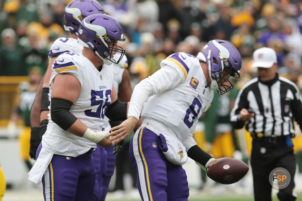 GREEN BAY, WI - OCTOBER 29: Minnesota Vikings quarterback Kirk Cousins (8) tries to stand but can’t put pressure on his leg during a game between the Green Bay Packers and the Minnesota Vikings on October 29, 2023 at Lambeau Field, in Green Bay, WI. (Photo by Larry Radloff/Icon Sportswire)