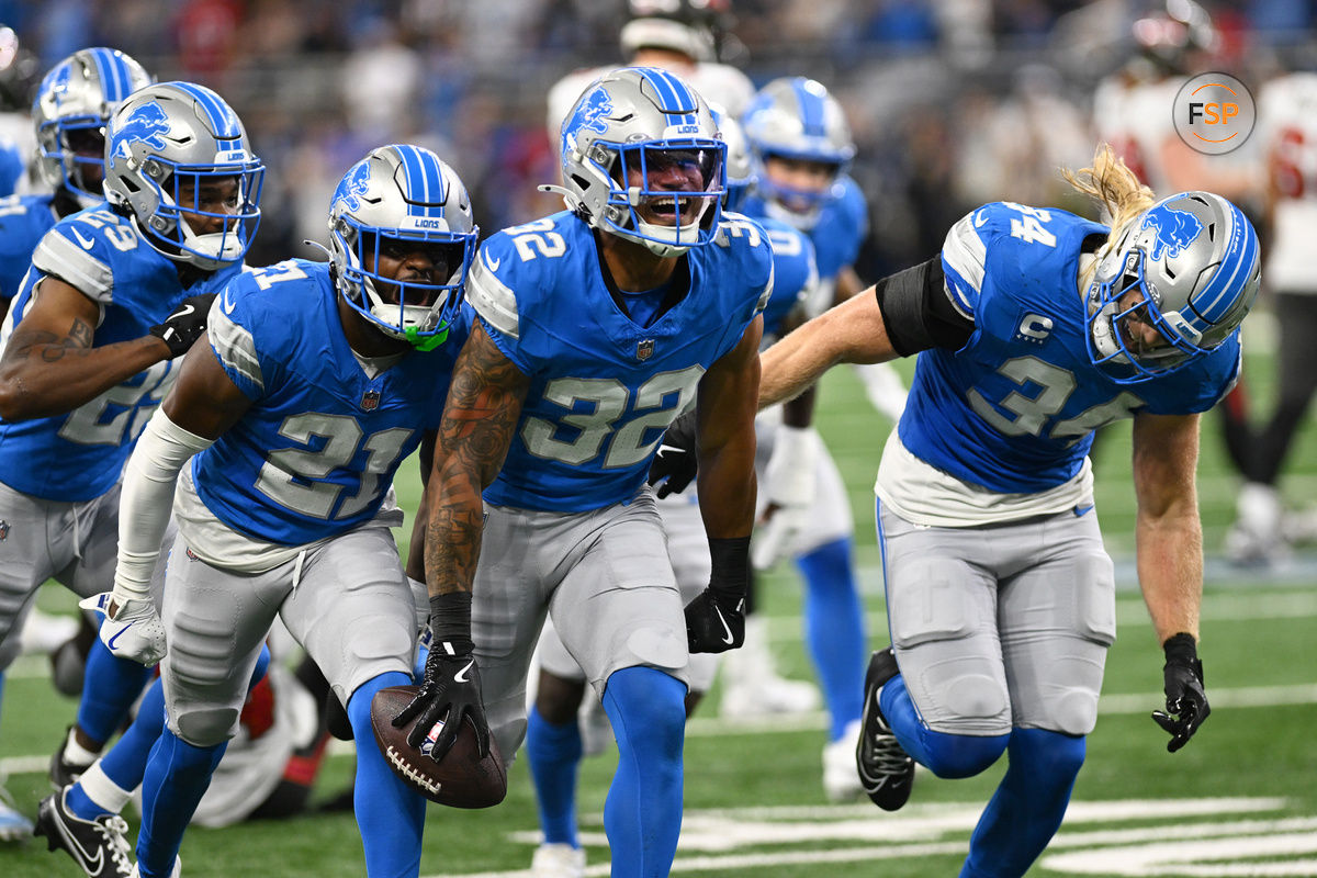 Sep 15, 2024; Detroit, Michigan, USA;  Detroit Lions safety Brian Branch (32) celebrates after intercepting a pass from Tampa Bay Buccaneers quarterback Baker Mayfield (not pictured) in the second quarter at Ford Field. Credit: Lon Horwedel-Imagn Images