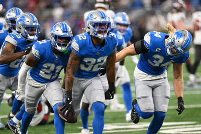 Sep 15, 2024; Detroit, Michigan, USA;  Detroit Lions safety Brian Branch (32) celebrates after intercepting a pass from Tampa Bay Buccaneers quarterback Baker Mayfield (not pictured) in the second quarter at Ford Field. Mandatory Credit: Lon Horwedel-Imagn Images