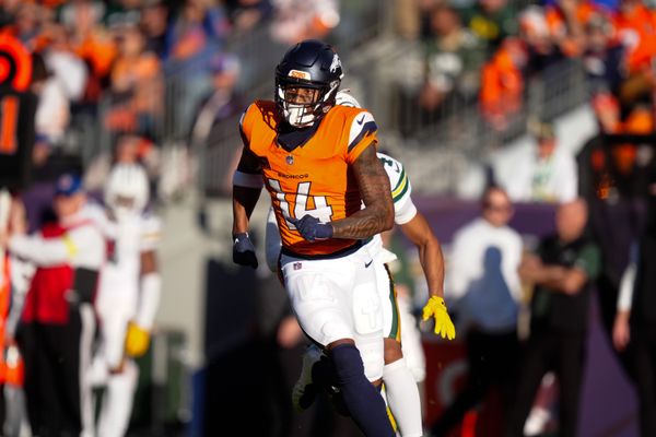 Dec 14, 2025; Denver, Colorado, USA; Denver Broncos wide receiver Courtland Sutton (14) runs downfield during the second quarter against the Green Bay Packers at Empower Field at Mile High. Mandatory Credit: Ron Chenoy-Imagn Images
