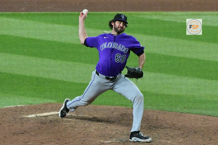 Aug 12, 2026; Phoenix, Arizona, USA; Colorado Rockies pitcher Jordan Romano (68) throws in the ninth inning against the Arizona Diamondbacks at Chase Field. Credit: Matt Kartozian-Imagn Images