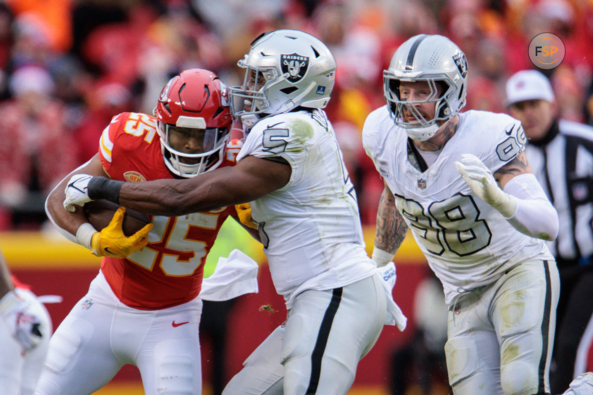 KANSAS CITY, MO - DECEMBER 25: Las Vegas Raiders linebacker Divine Deablo (5) tackles Kansas City Chiefs running back Clyde Edwards-Helaire (25) during the second half on December 25th, 2023 at Arrowhead Stadium in Kansas City, Missouri. (Photo by William Purnell/Icon Sportswire)