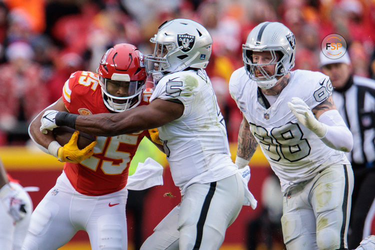 KANSAS CITY, MO - DECEMBER 25: Las Vegas Raiders linebacker Divine Deablo (5) tackles Kansas City Chiefs running back Clyde Edwards-Helaire (25) during the second half on December 25th, 2023 at Arrowhead Stadium in Kansas City, Missouri. (Photo by William Purnell/Icon Sportswire)