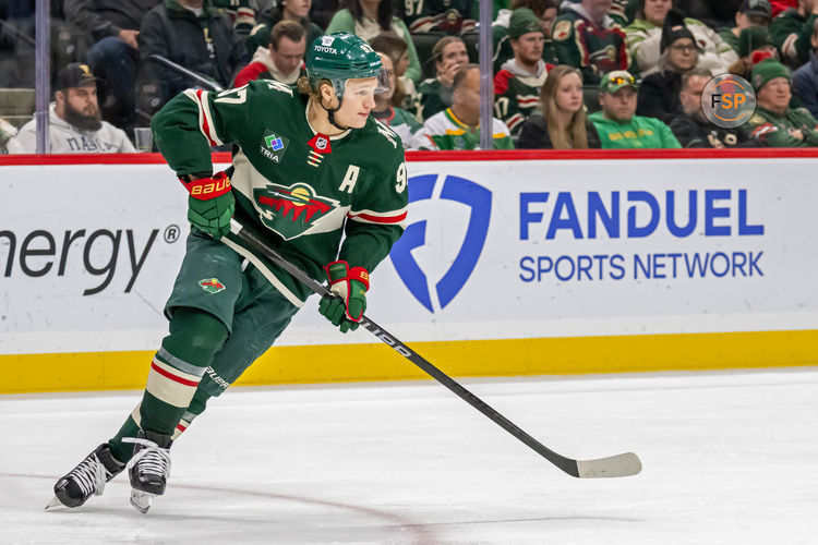 Dec 20, 2024; Saint Paul, Minnesota, USA;  Minnesota Wild forward Kirill Kaprizov (97) turns up ice against the Utah Hockey Club during the third period at Xcel Energy Center. Credit: Nick Wosika-Imagn Images