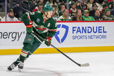 Dec 20, 2024; Saint Paul, Minnesota, USA;  Minnesota Wild forward Kirill Kaprizov (97) turns up ice against the Utah Hockey Club during the third period at Xcel Energy Center. Mandatory Credit: Nick Wosika-Imagn Images