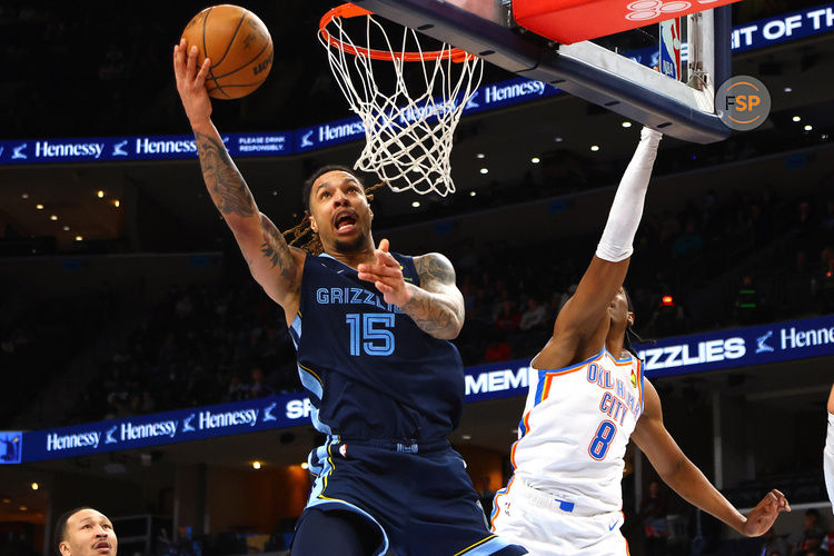 Mar 5, 2025; Memphis, Tennessee, USA; Memphis Grizzlies forward Brandon Clarke (15) shoots as Oklahoma City Thunder forward Jalen Williams (8) defends during the fourth quarter at FedExForum. Credit: Petre Thomas-Imagn Images