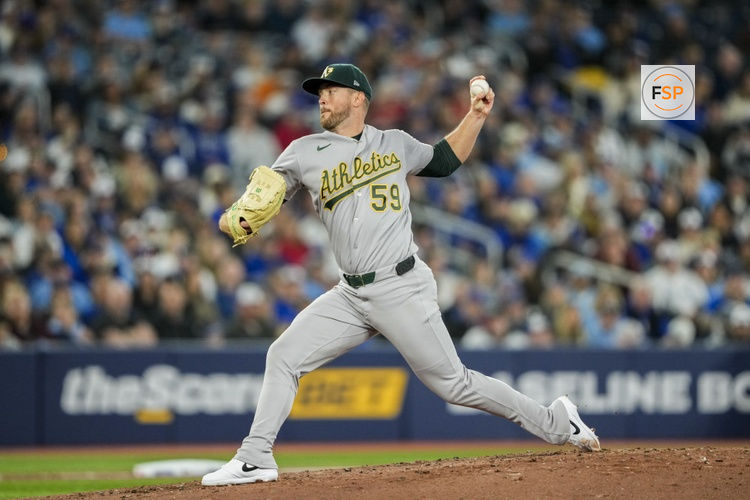 Mar 28, 2026; Toronto, Ontario, CAN;  Athletics pitcher Jeffrey Springs (59) pitches to the Toronto Blue Jays during the second inning at Rogers Centre. Credit: Kevin Sousa-Imagn Images