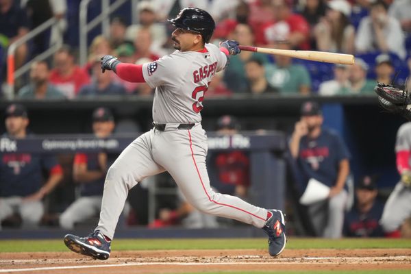 Aug 25, 2026; Miami, Florida, USA;  Boston Red Sox designated hitter Mickey Gasper (30) hits a solo home run in the second inning against the Miami Marlins at loanDepot Park.  Mandatory Credit: Jim Rassol-Imagn Images