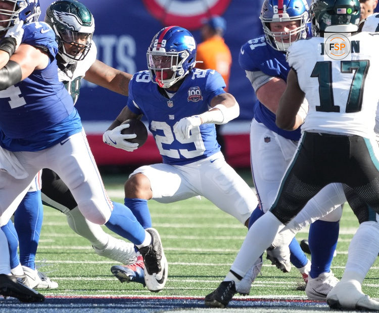 Oct 20, 2024; East Rutherford, New Jersey, USA;  New York Giants running back Tyrone Tracy Jr. (29) runs against the Philadelphia Eagles during the second half at MetLife Stadium. Credit: Robert Deutsch-Imagn Images
