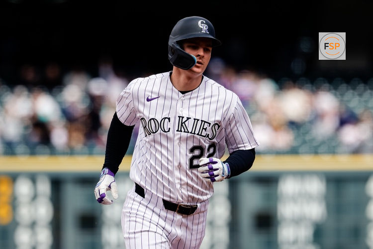 Apr 23, 2026; Denver, Colorado, USA; Colorado Rockies left fielder Mickey Moniak (22) rounds the bases on a solo home run in the first inning against the San Diego Padres at Coors Field. Credit: Isaiah J. Downing-Imagn Images