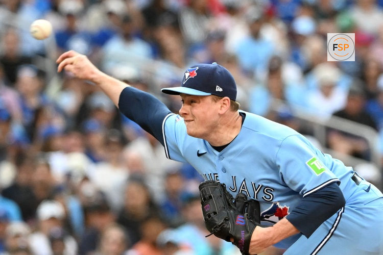Jun 6, 2026; Toronto, Ontario, CAN;  Toronto Blue Jays relief pitcher Louis Varland (77) delivers a pitch against the Baltimore Orioles in the ninth inning at Rogers Centre. Credit: Dan Hamilton-Imagn Images