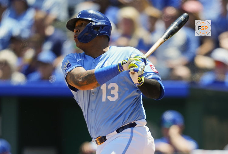 May 8, 2025; Kansas City, Missouri, USA; Kansas City Royals designated hitter Salvador Perez (13) hits an RBI double during the first inning against the Chicago White Sox at Kauffman Stadium. Credit: Jay Biggerstaff-Imagn Images