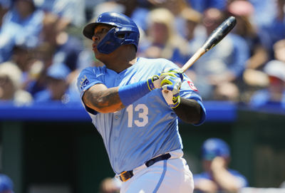 May 8, 2025; Kansas City, Missouri, USA; Kansas City Royals designated hitter Salvador Perez (13) hits an RBI double during the first inning against the Chicago White Sox at Kauffman Stadium. Mandatory Credit: Jay Biggerstaff-Imagn Images