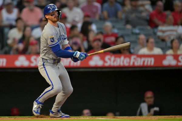 Sep 23, 2025; Anaheim, California, USA;  Kansas City Royals shortstop Bobby Witt Jr. (7) hits a RBI single during the first inning against the Los Angeles Angels at Angel Stadium. Mandatory Credit: Jayne Kamin-Oncea-Imagn Images