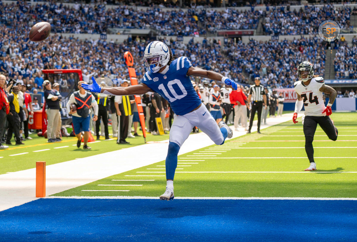 Sep 8, 2024; Indianapolis, Indiana, USA; Indianapolis Colts wide receiver Adonai Mitchell (10) reaches for an overthrown pass in front of Houston Texans cornerback Derek Stingley Jr. (24) during the second quarter at Lucas Oil Stadium. Credit: Marc Lebryk-Imagn Images