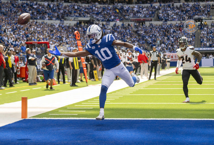 Sep 8, 2024; Indianapolis, Indiana, USA; Indianapolis Colts wide receiver Adonai Mitchell (10) reaches for an overthrown pass in front of Houston Texans cornerback Derek Stingley Jr. (24) during the second quarter at Lucas Oil Stadium. Credit: Marc Lebryk-Imagn Images