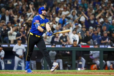 May 30, 2025; Seattle, Washington, USA; Seattle Mariners catcher Cal Raleigh (29) hits a two-run home run against the Minnesota Twins during the eighth inning at T-Mobile Park. Mandatory Credit: Joe Nicholson-Imagn Images