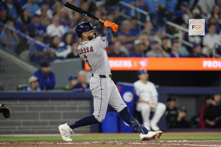Sep 10, 2025; Toronto, Ontario, CAN; Houston Astros shortstop Carlos Correa (1) hits a solo home run against the Toronto Blue Jays during the sixth inning at Rogers Centre. Credit: John E. Sokolowski-Imagn Images