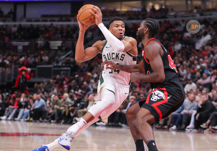 CHICAGO, IL - NOVEMBER 30: Patrick Williams #44 of the Chicago Bulls posts up against Giannis Antetokounmpo #34 of the Milwaukee Bucks during the second half against the Chicago Bulls at the United Center on November 30, 2023 in Chicago, Illinois. (Photo by Melissa Tamez/Icon Sportswire)