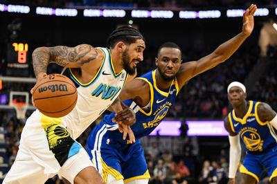 Dec 23, 2024; San Francisco, California, USA; Indiana Pacers forward Obi Toppin (1) drives to the basket against Golden State Warriors forward Andrew Wiggins (22) in the second quarter at Chase Center. Mandatory Credit: Eakin Howard-Imagn Images