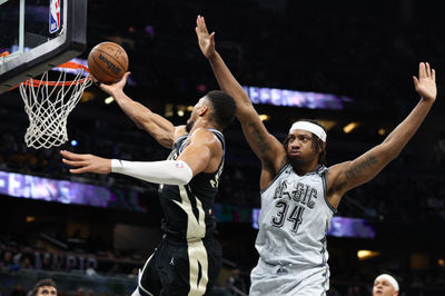 Jan 10, 2025; Orlando, Florida, USA; Milwaukee Bucks forward Giannis Antetokounmpo (34) drives to the basket past Orlando Magic center Wendell Carter Jr. (34) in the second quarter at Kia Center. Mandatory Credit: Nathan Ray Seebeck-Imagn Images