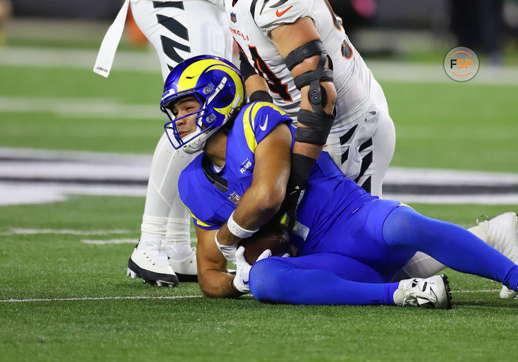 CINCINNATI, OH - SEPTEMBER 25: Los Angeles Rams wide receiver Puka Nacua (17) is tackled by Cincinnati Bengals defensive end Sam Hubbard (94) in a game between the Los Angeles Rams and the Cincinnati Bengals at Paycor Stadium on Monday, Sept. 25, 2023. (Photo by Jeff Moreland/Icon Sportswire)