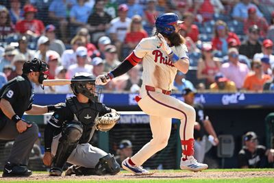 Jun 7, 2026; Philadelphia, Pennsylvania, USA; Philadelphia Phillies left fielder Brandon Marsh (16) watches his RBI single against the Chicago White Sox during the sixth inning at Citizens Bank Park. Mandatory Credit: Eric Hartline-Imagn Images