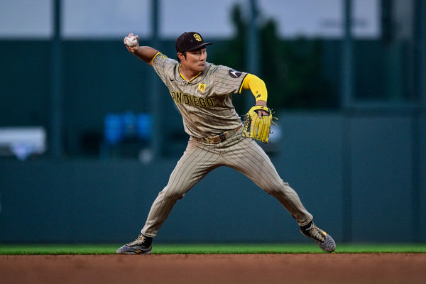 DENVER, CO - APRIL 24: San Diego Padres shortstop Ha-Seong Kim (7) throws to first base after fielding a ground ball during a game between the San Diego Padres and the Colorado Rockies at Coors Field on April 24, 2024 in Denver, Colorado. (Photo by Dustin Bradford/Icon Sportswire)