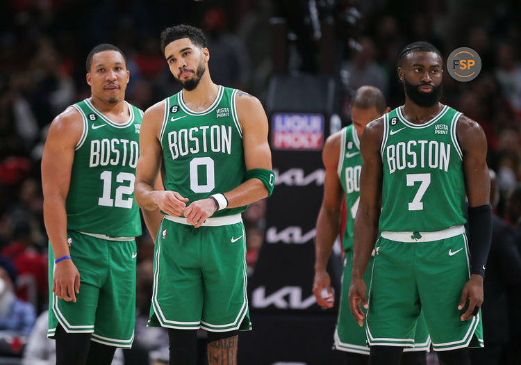 CHICAGO, IL - NOVEMBER 21: Boston Celtics forward Grant Williams (12) Boston Celtics forward Jayson Tatum (0) and Boston Celtics guard Jaylen Brown (7) looks on
during a NBA game between the Boston Celtics and the Chicago Bulls on November 21, 2022 at the United Center in Chicago, IL. (Photo by Melissa Tamez/Icon Sportswire)
