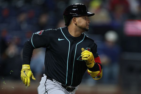 Apr 9, 2026; New York City, New York, USA;  Arizona Diamondbacks catcher Gabriel Moreno (14) hits an RBI double during the eighth inning against the New York Mets at Citi Field. Mandatory Credit: Vincent Carchietta-Imagn Images
