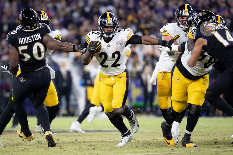 BALTIMORE, MD - JANUARY 01: Pittsburgh Steelers running back Najee Harris (22) attempts to stiff arm a Baltimore Ravens defender during the game between the Pittsburgh Steelers and the Baltimore Ravens on January 1, 2023 at M&T Bank Stadium in Baltimore, MD. (Photo by Charles Brock/Icon Sportswire)