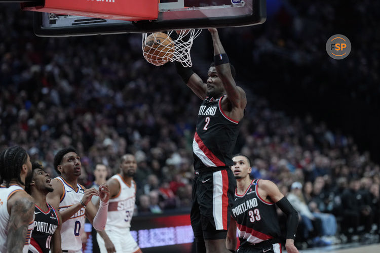 Feb 1, 2025; Portland, Oregon, USA; Portland Trail Blazers center Deandre Ayton (2) dunks the ball during the second half against the Phoenix Suns at Moda Center. Credit: Soobum Im-Imagn Images