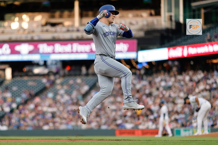 Aug 5, 2025; Denver, Colorado, USA; Toronto Blue Jays center fielder Daulton Varsho (5) rounds the bases on a two run home run in the fourth inning against the Colorado Rockies at Coors Field. Credit: Isaiah J. Downing-Imagn Images